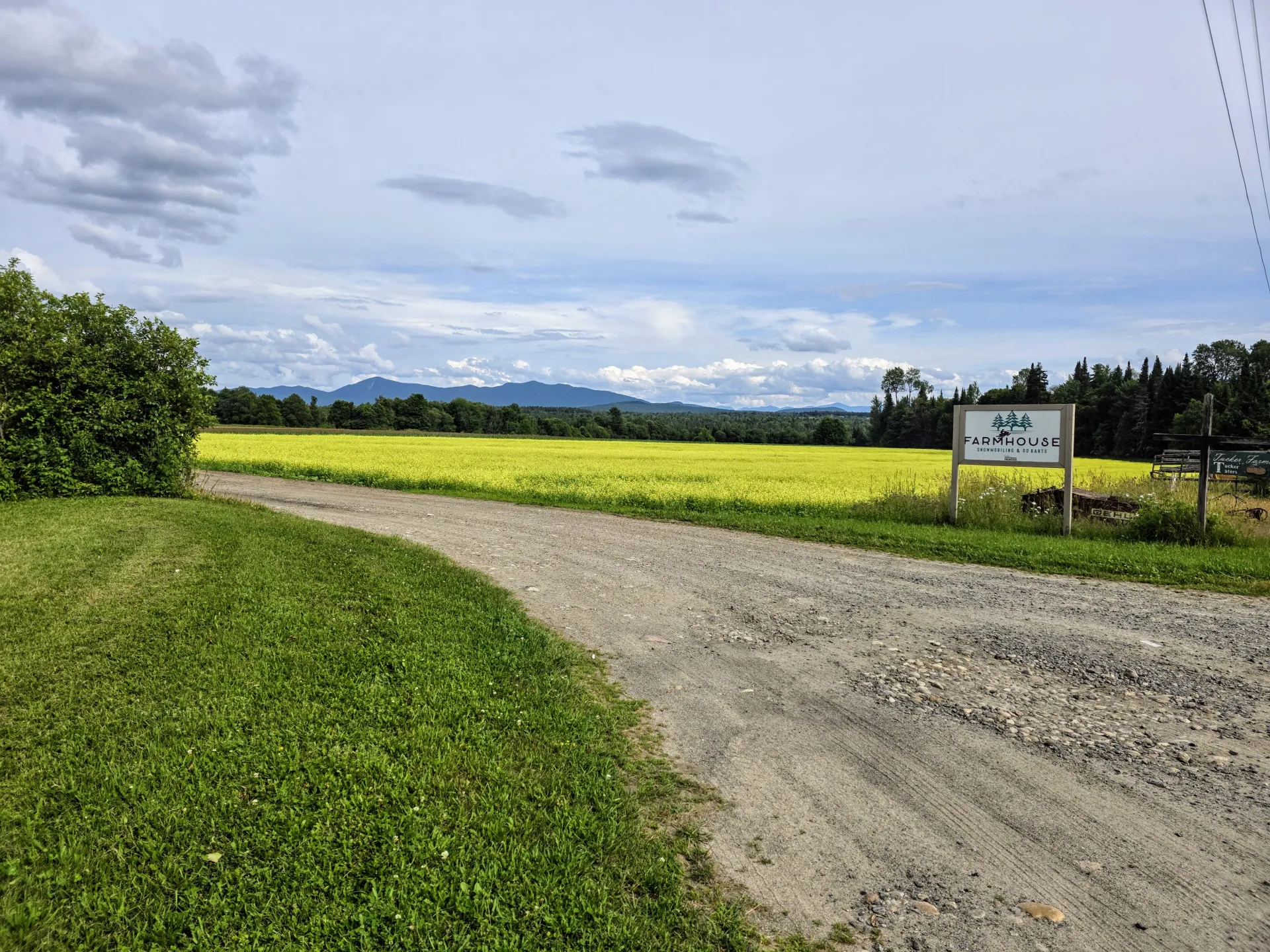 Farmhouse UTV signage and fields.
